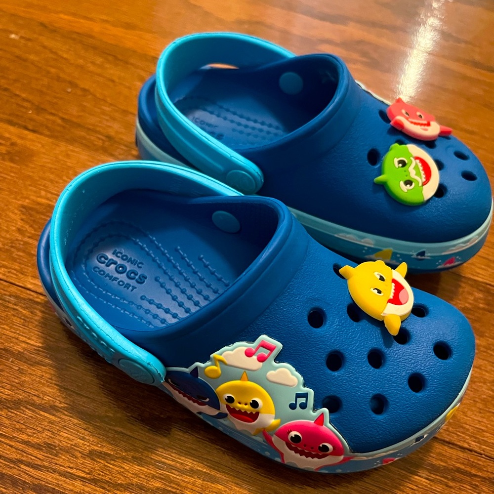 Slightly Worn Baby Shark Crocs with charms